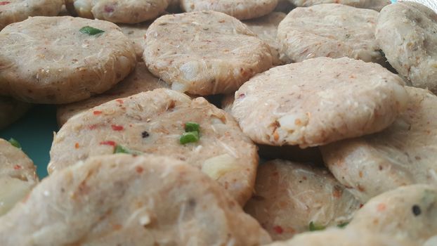 Spicy and tasty uncooked kebab stuffed with minced meat, onion,  alo paste and chana. Asian spicy cuisine.