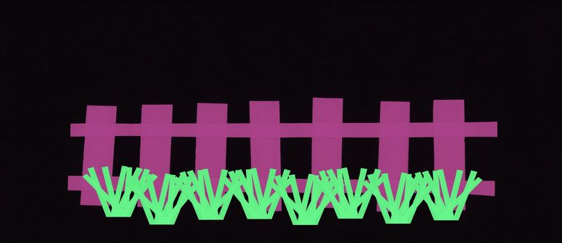illustration of a fence with grass made with paper strips