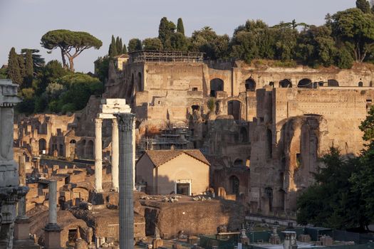 Rome, Italy - June 27, 2010: Panoramic view of the Roman Forum and Palatine Hill at sunset, in the center, the Ancient Church of Saint Mary, Rome.