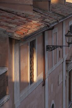 Rome, Italy - June 27, 2010: Afternoon light on one of the side windows of the church of San Giuseppe dei Falegnami, Rome.