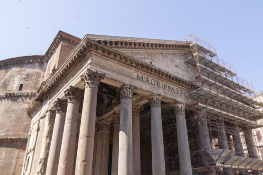 Rome, Italy - June 28, 2010: The Pantheon, and Basilica of Santa María Rotonda, partially covered with scaffolding during the rehabilitation works of its main facade.