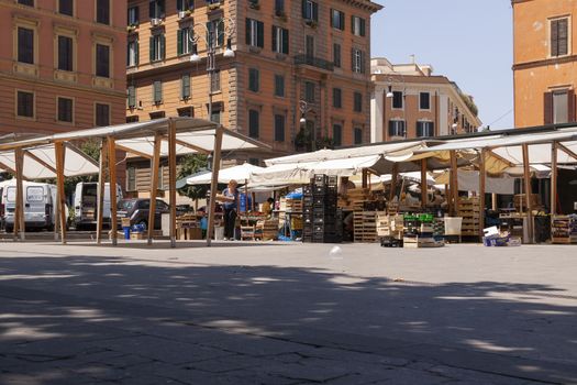 Rome, Italy - June 28, 2010: Closed fruit stalls in a street market in Rome.