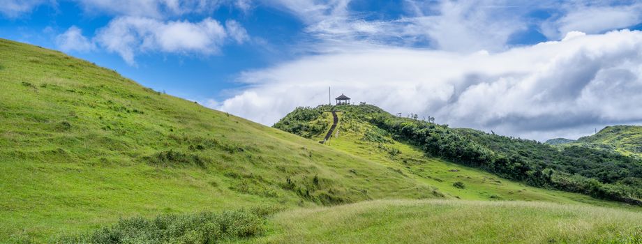 Beautiful grassland, prairie in Taoyuan Valley, Caoling Mountain Trail passes over the peak of Mt. Wankengtou in Taiwan.