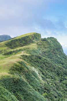 Beautiful grassland, prairie in Taoyuan Valley, Caoling Mountain Trail passes over the peak of Mt. Wankengtou in Taiwan.