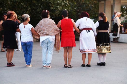 Varna, Bulgaria - September, 06, 2020: people dancing national Bulgarian dance