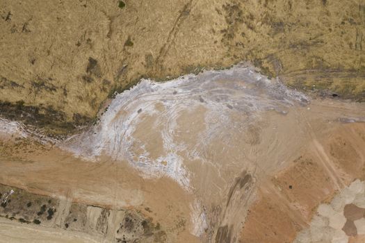 Aerial view of sand patterns in a dry river bed