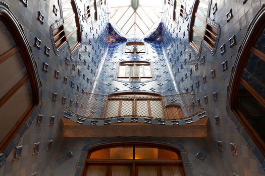 Barcelona, Spain - 30 July 2020: Casa Batllo atrium with inner windows