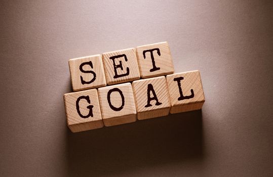 Set goal Word Written on Wooden Cubes