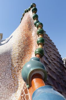 Barcelona, Spain - 30 July 2020: Roof of Casa Batllo, mosaic close-up