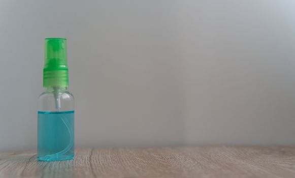 alcohol sanitizer bottle on table