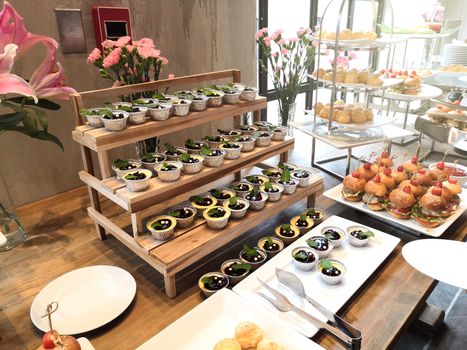 burberry cheese cake, mini hamburger, choux cream on table serve for party and seminar