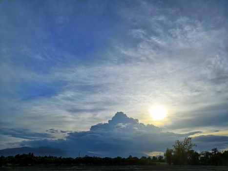 Cloud shaped like mountains and sunset