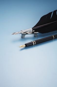 black quill with metal fountain pen nib