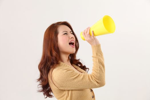 Woman screaming into bullhorn