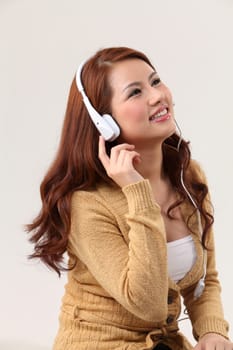 Young woman listening to music