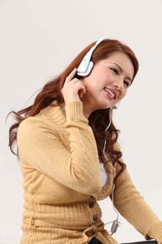 Young woman listening to music