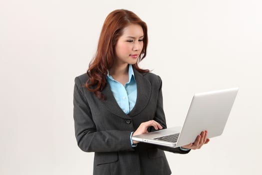 business woman holding a laptop