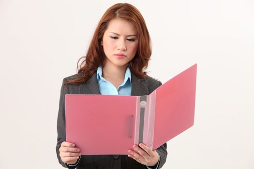businesswoman reading a document file