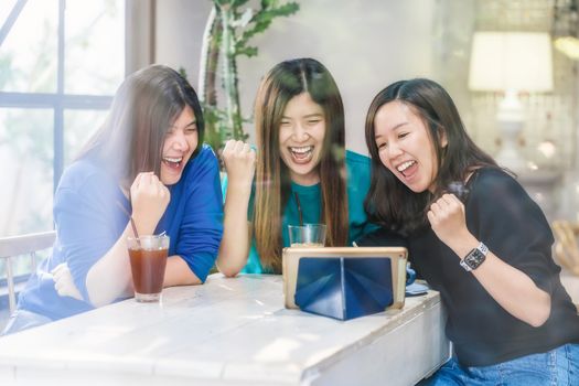 Group of Three asian businesswoman freelancer working with success happy action and celebrate in the working space, startup small business, entrepreneur and partnership working at workplace concept