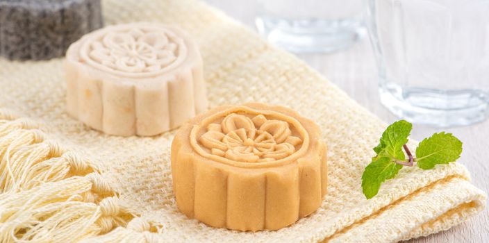 Colorful beautiful moon cake, mung bean cake, Champion Scholar Pastry cake for Mid-Autumn festival traditional gourmet dessert snack, close up.