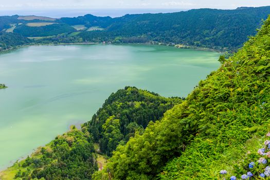 View of the Lake Furnas (Lagoa das Furnas) on Sao Miguel Island, Azores, Portugal from the Pico do Ferro scenic viewpoint.