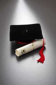 education concept of mini mortar board and certificate