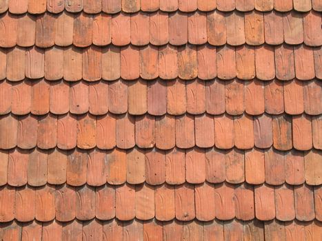 The plain tile is a flat, at the bottom often round cut shaped roof tile.