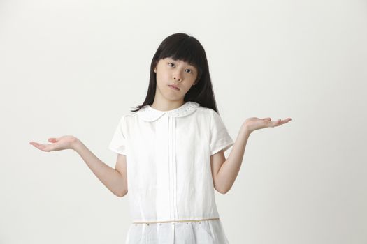 chinese girl standing with hand open