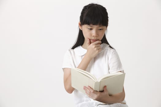 chinese girl enjoy reading book