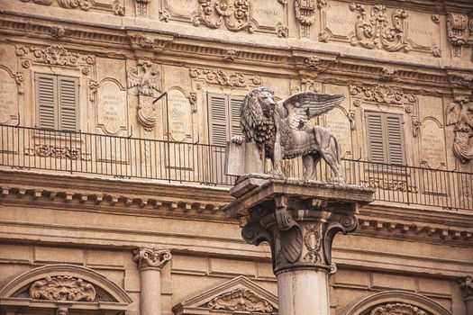 Saint Mark lion detail in Piazza delle Erbe in Verona in Italy