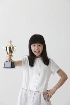 girl happy to own a trophy