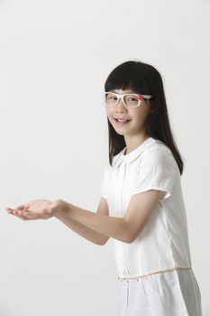 chinese girl bring up her hand to receive