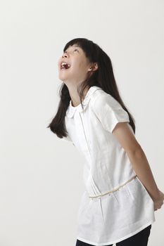 chinese girl with surprise expression and looking up
