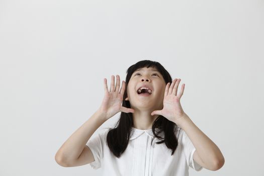 chinese girl screaming and looking up