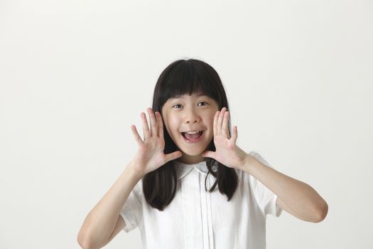 chinese girl screaming and looking at camera