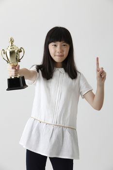 chinese girl holding trophy and with gesture 1