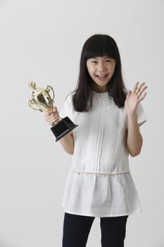 chinese girl happy to own a trophy