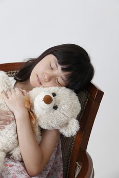 chinese girl sleeping with teddy bear
