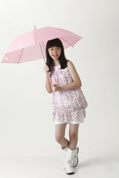 chinese girl holding a pink umbrella