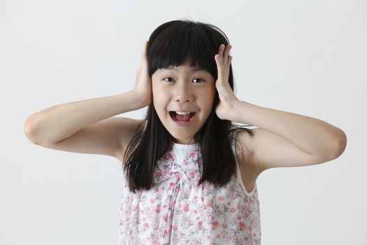 chinese girl with surprise expression