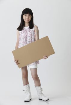 chinese girl holding a brown message board