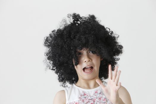chinese girl wearing a big black wig surprise