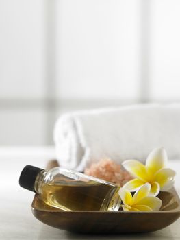 massage oil,salt and towel for the spa concept