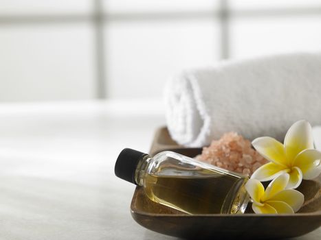 massage oil,salt and towel for the spa concept