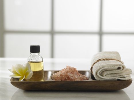 massage oil,salt and towel for the spa concept