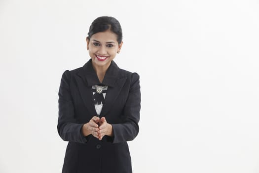 front view of the businesswoman with hand gesture greeting