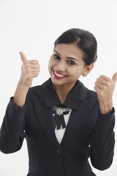  formal Asian Business woman with thumbs up