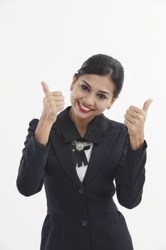  formal Asian Business woman with thumbs up