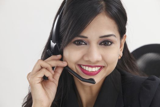 close up of the receptionist smiling,talking