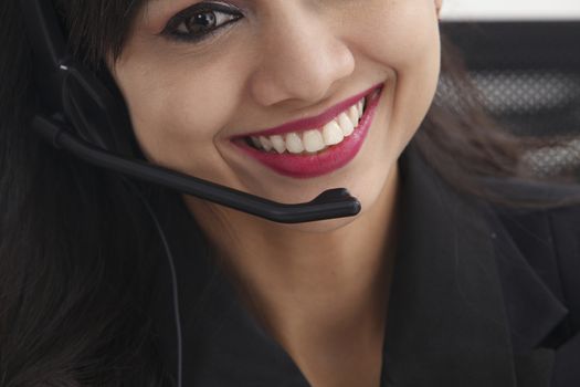 close up at the teeth of receptionist talking 